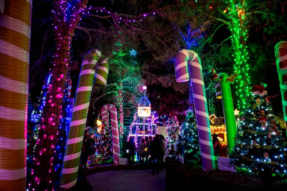 People enjoy the Magical Forest at Opportunity Village, on Friday, Nov. 25, 2016, in Las Vegas. ...