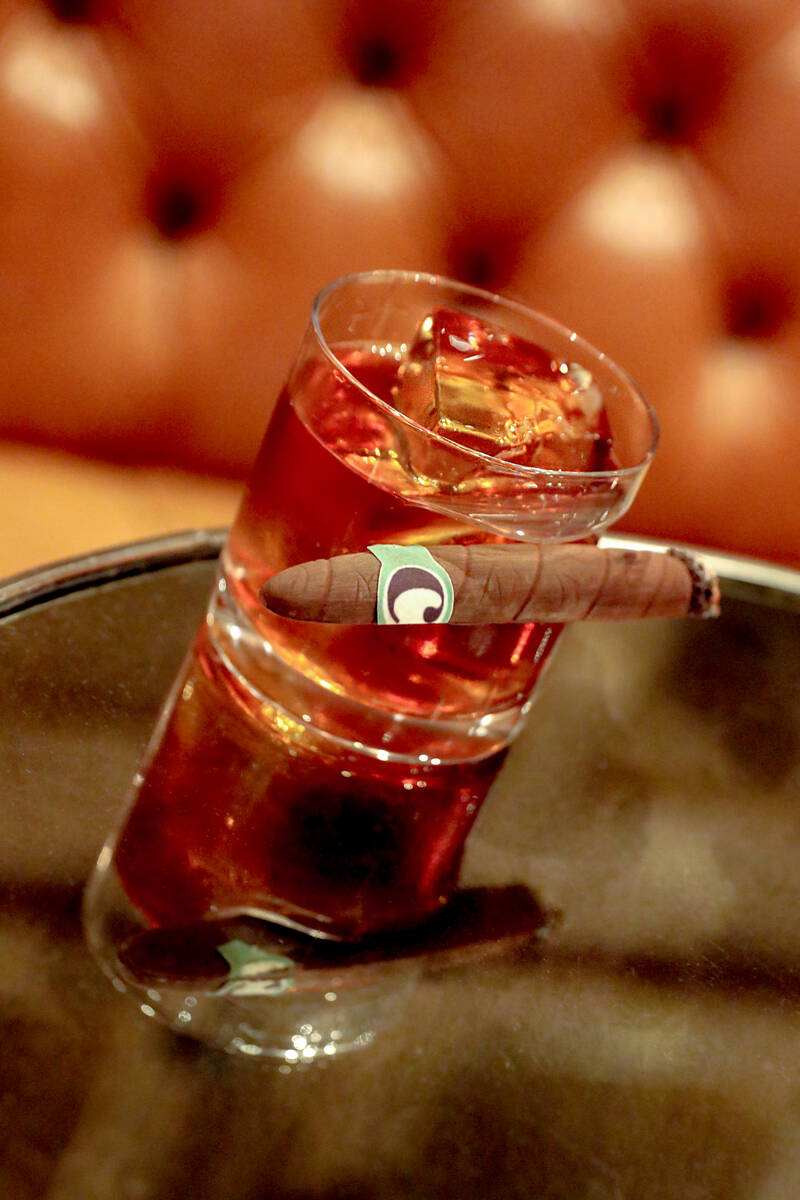 A Cigar Lover's Manhattan (with chocolate cigar) from The Chandelier bar in The Cosmopolitan of ...