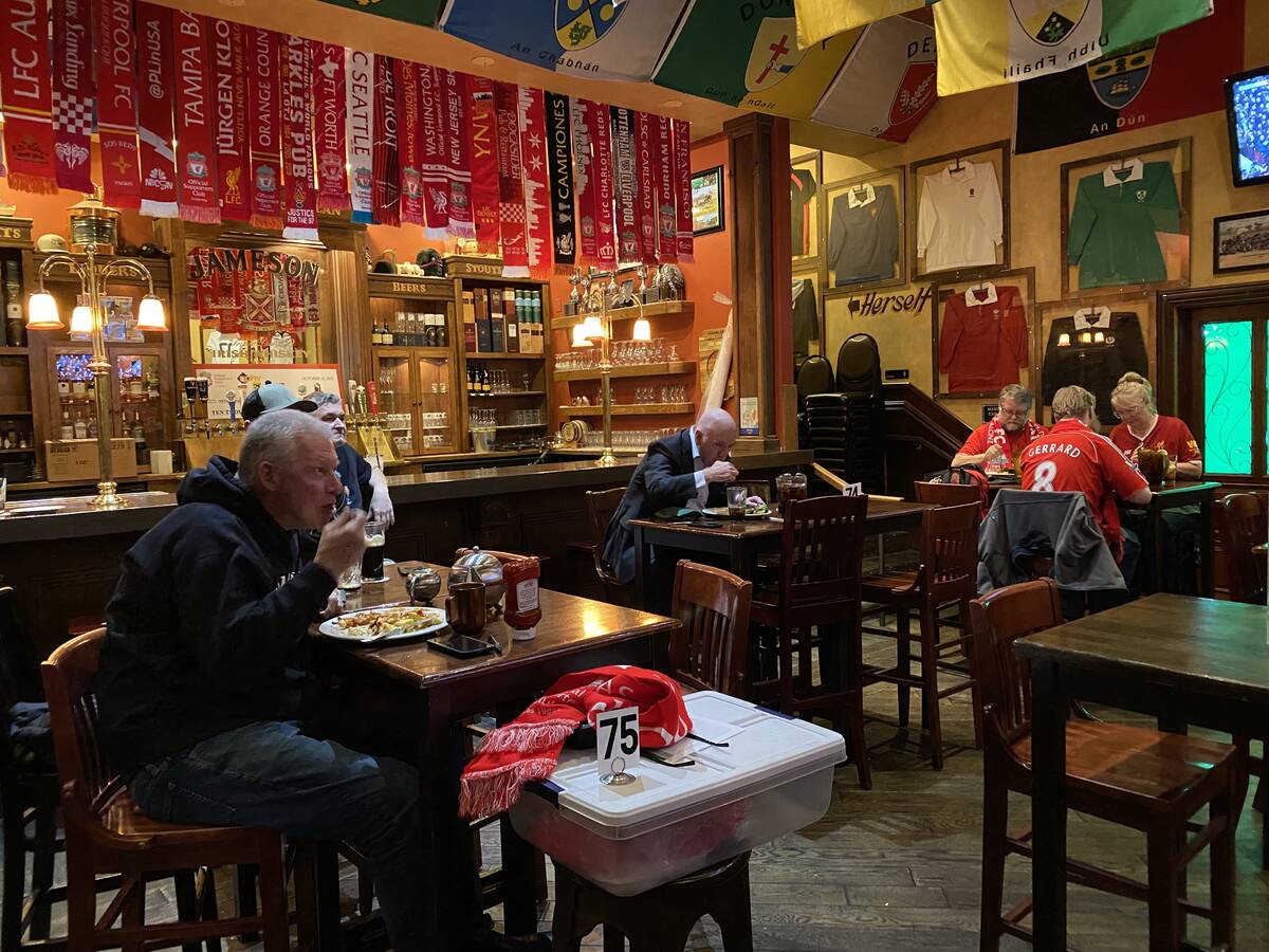 Liverpool supporters watch their team play inside McMullan's Irish Pub, 4650 W Tropicana Ave., ...