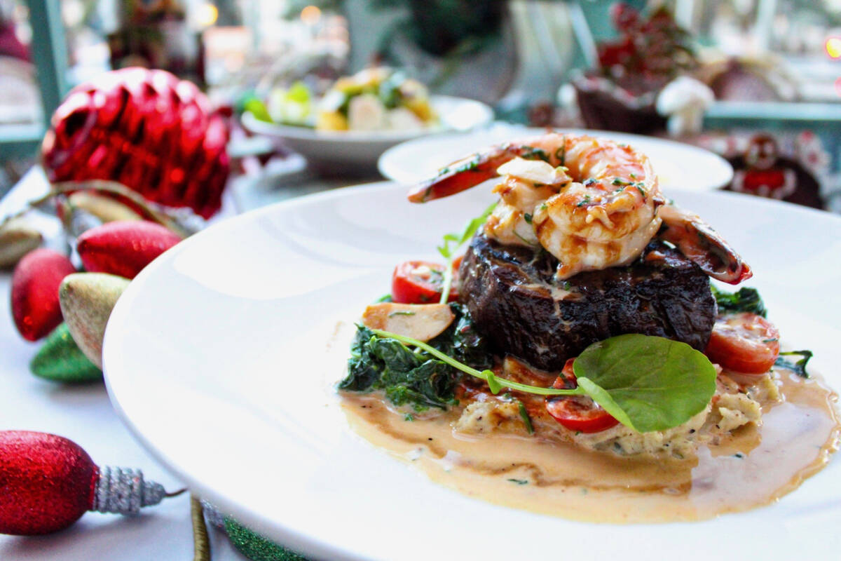 Petite filet and garlic shrimp is being served on Christmas Day 2022 at Mon Ami Gabi in Paris L ...