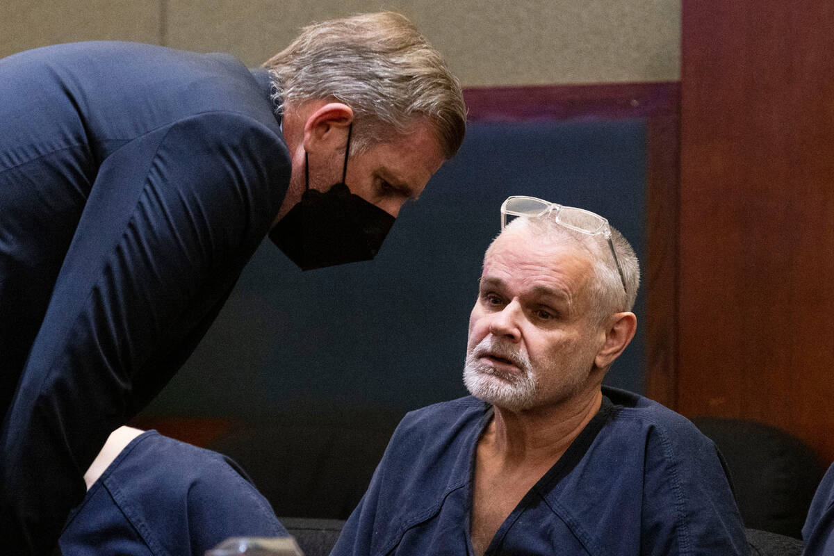 Eric Holland, right, talks to his attorney, David Westbrook, during his sentencing at the Regio ...