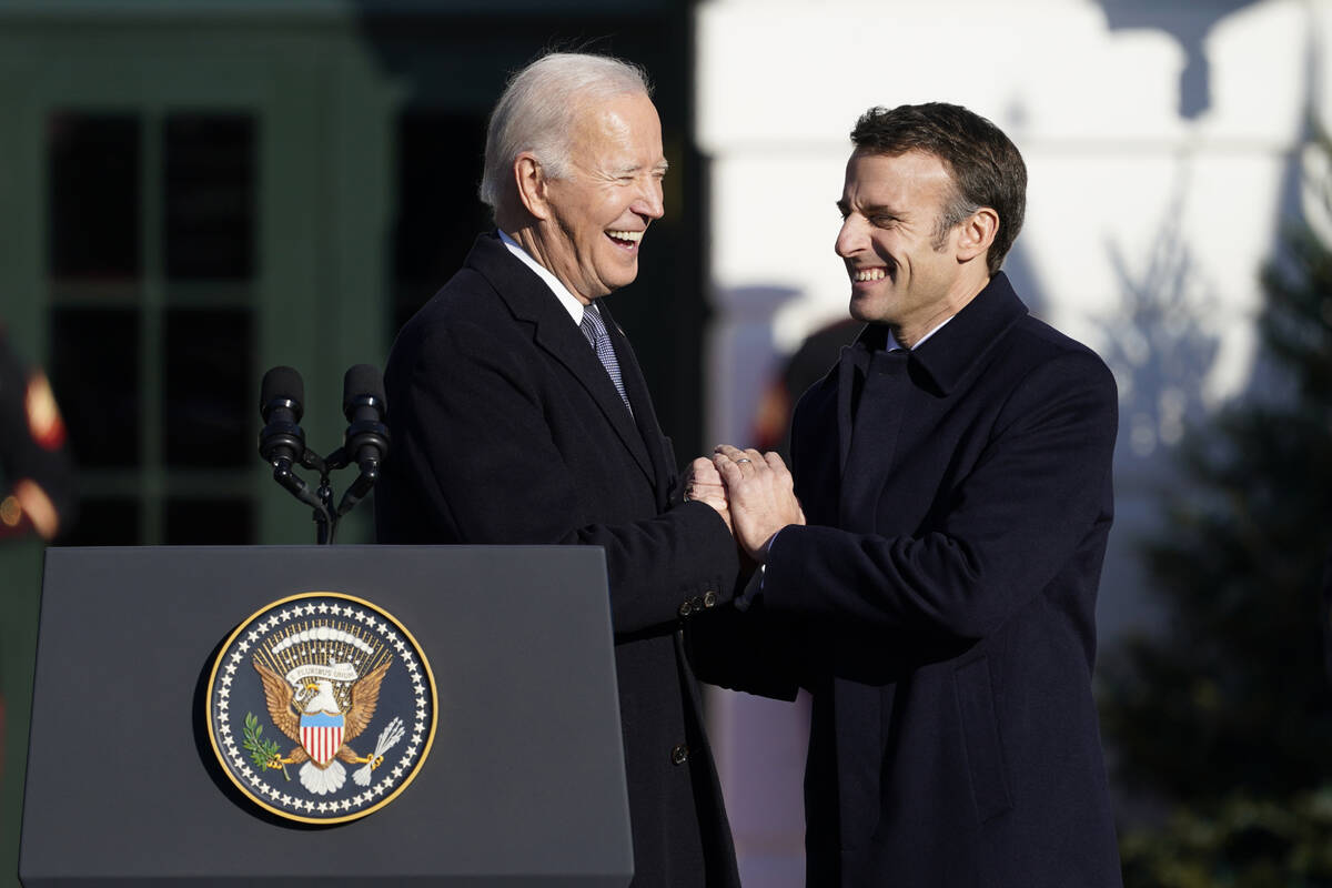 President Joe Biden welcomes French President Emmanuel Macron during a State Arrival Ceremony o ...
