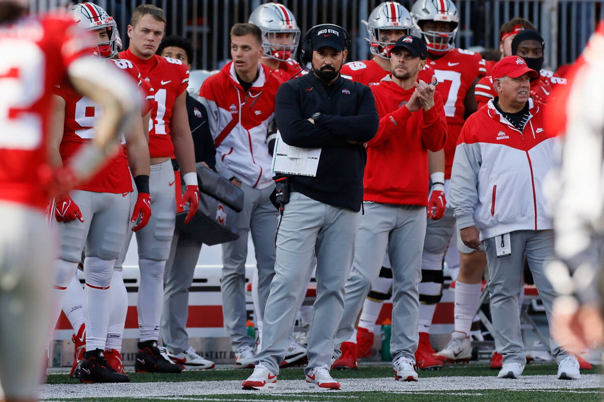 Ohio State head coach Ryan Day stands on the sidelines against Michigan during an NCAA college ...