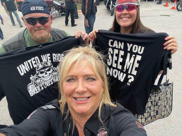 Laurie Montoya (middle) with two supporters of BikerDown. (Photo courtesy of Laurie Montoya)