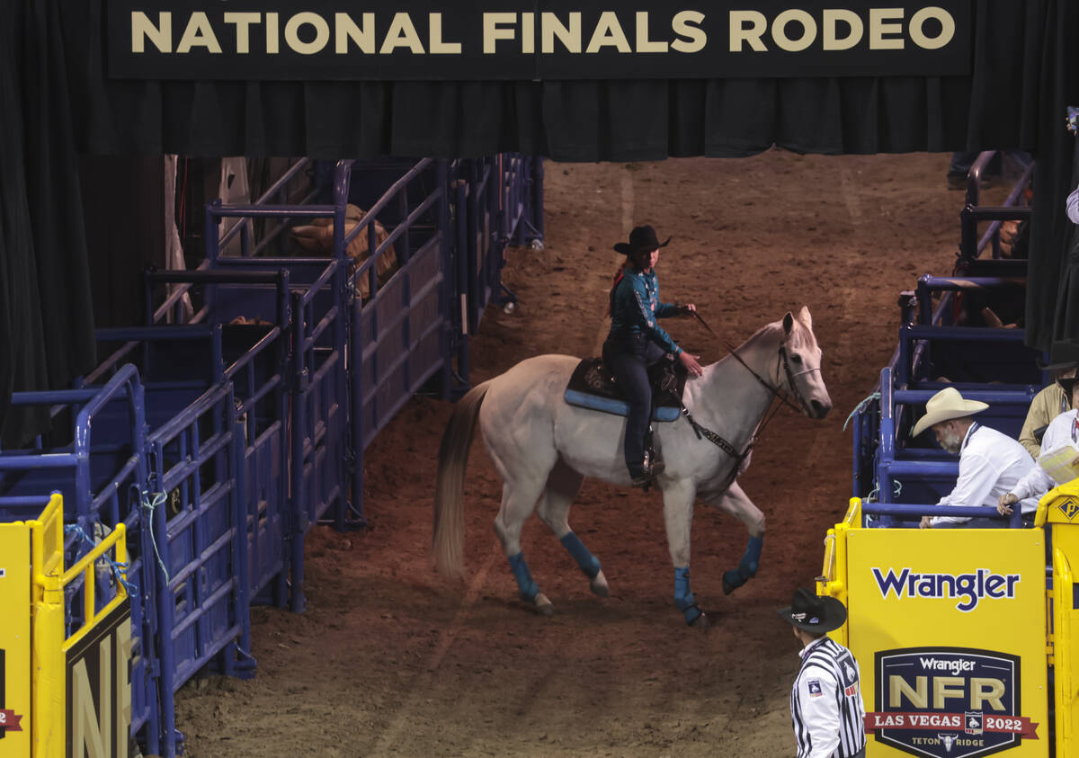 Emily Beisel, of Weatherford, Okla., prepares to compete in barrel racingcompetes during the fi ...