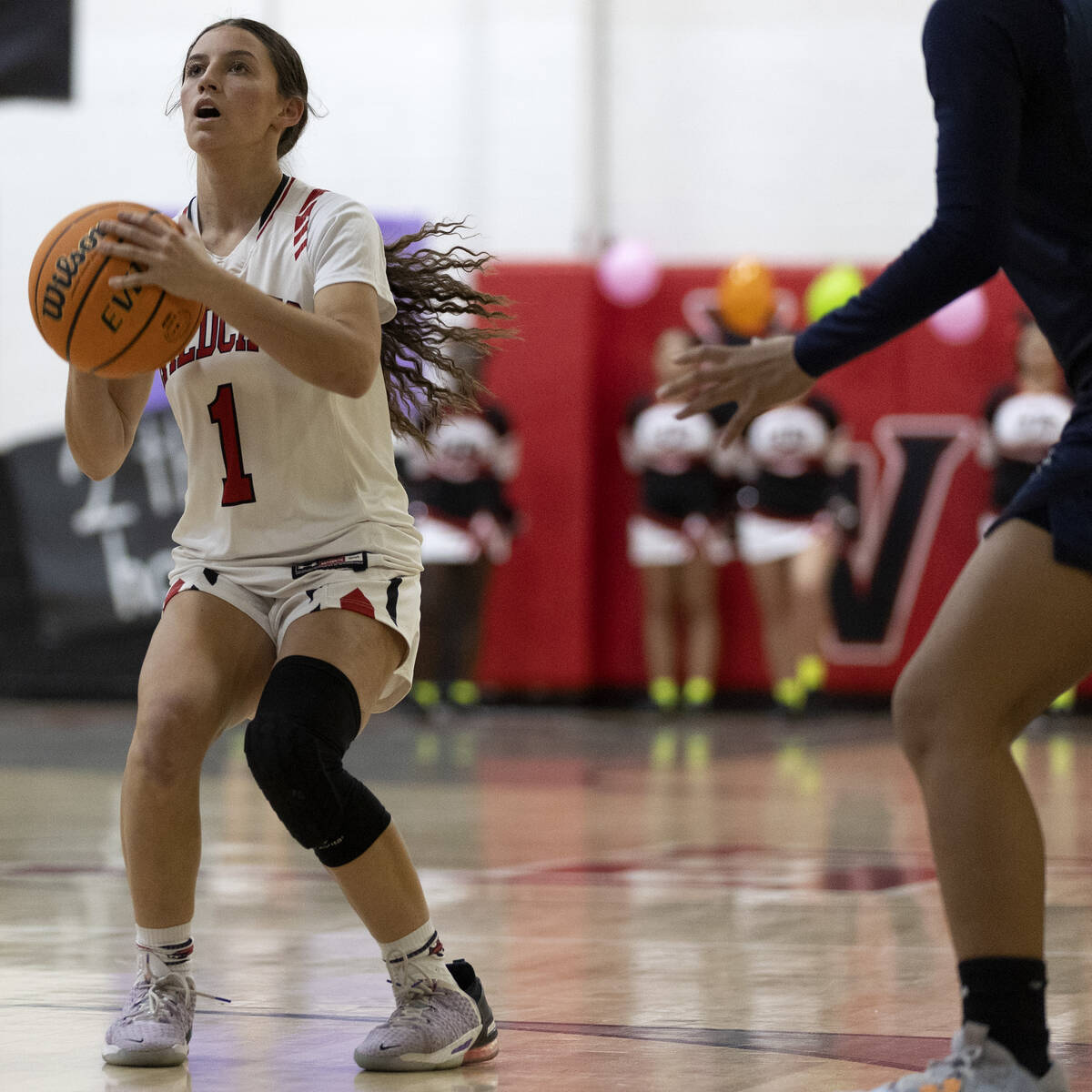 Las Vegas’ Layla Faught (1) prepares to shoot during a girls high school basketball game ...