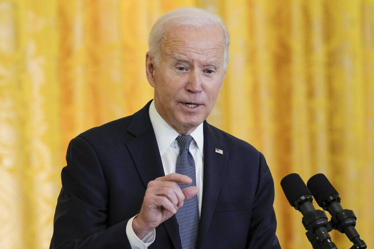 President Joe Biden speaks during a news conference with French President Emmanuel Macron in th ...