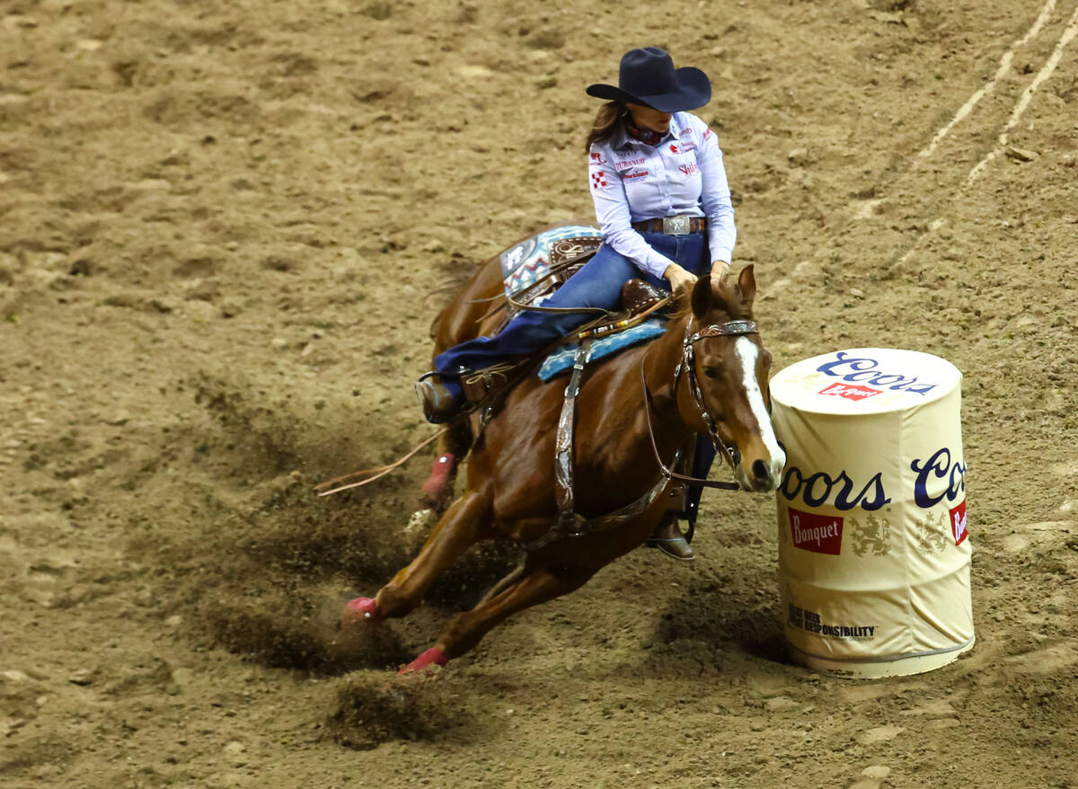 Jordon Briggs, of Tolar, Texas, competes in barrel racing during the first night of the Nationa ...