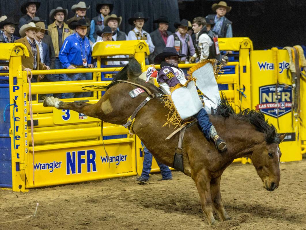 Bareback rider Kaycee Feild of Genola, Utah, rides Sunday Sinner during the National Finals Rod ...
