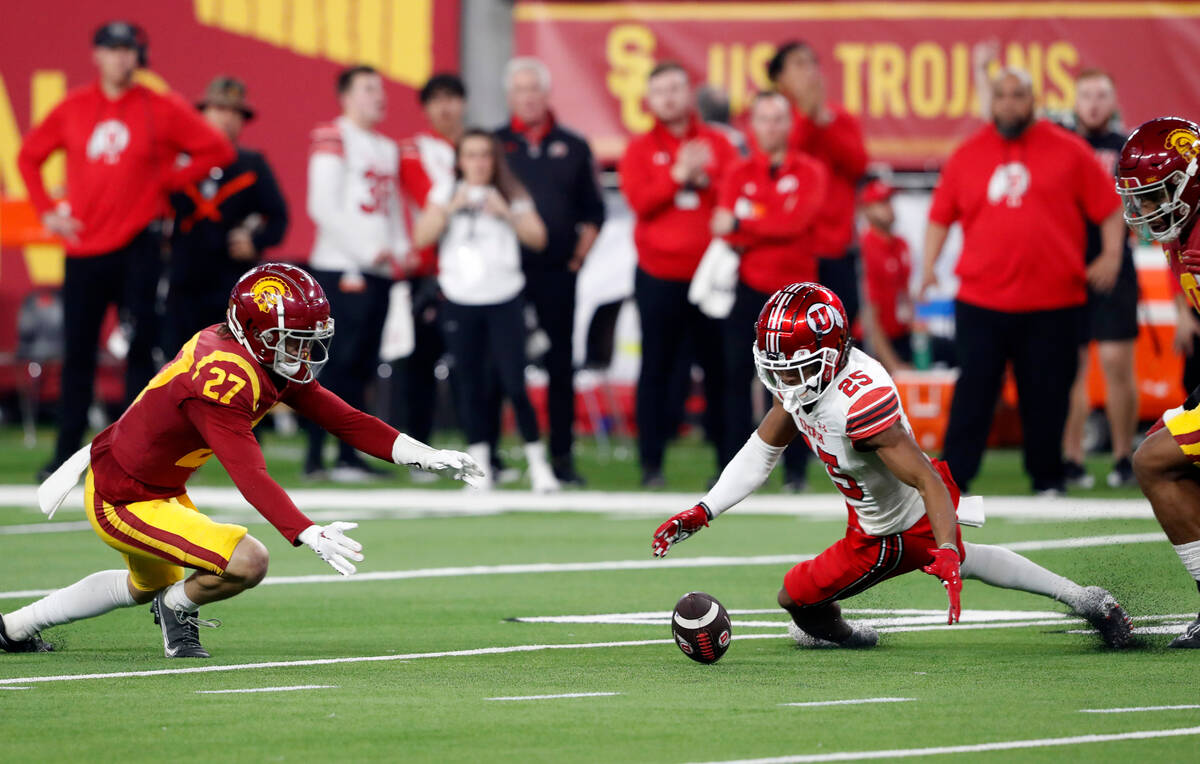 Utah wide receiver Jaylen Dixon (25) fumbles the ball during the first half of the Pac-12 Confe ...