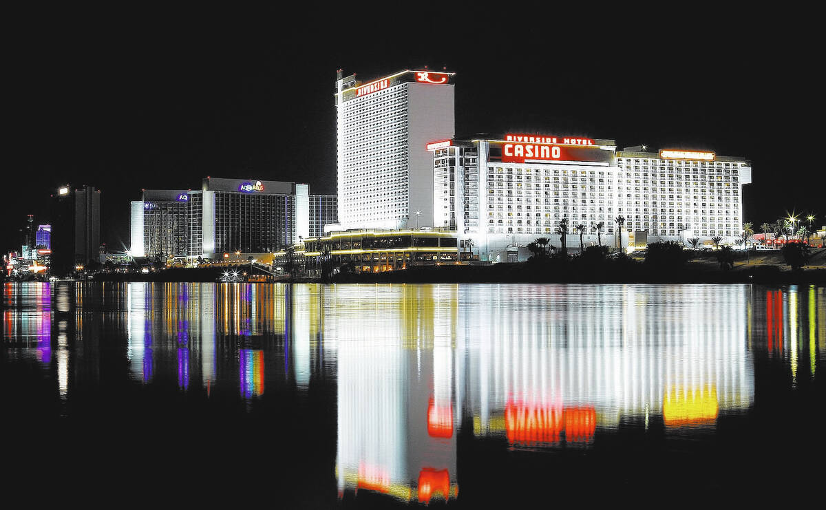 Don Laughlin's Riverside Resort Hotel & Casino casts its reflection on the Colorado River in La ...