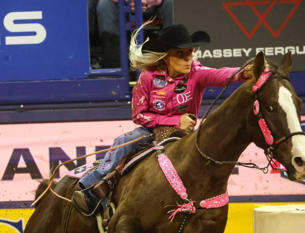 Bailey Choate, of Fort Worth, Texas, competes in barrel racing during the fifth go-round of the ...