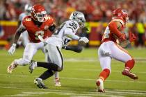 Raiders cornerback Nate Hobbs (39) pursues Kansas City Chiefs wide receiver Skyy Moore (24) wit ...
