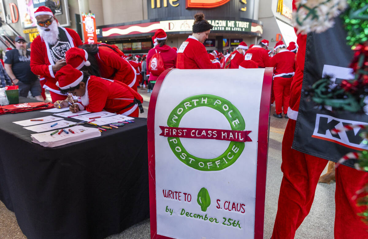 Letters to Santa can be written and sent during the pre-race entertainment from the Fremont Str ...