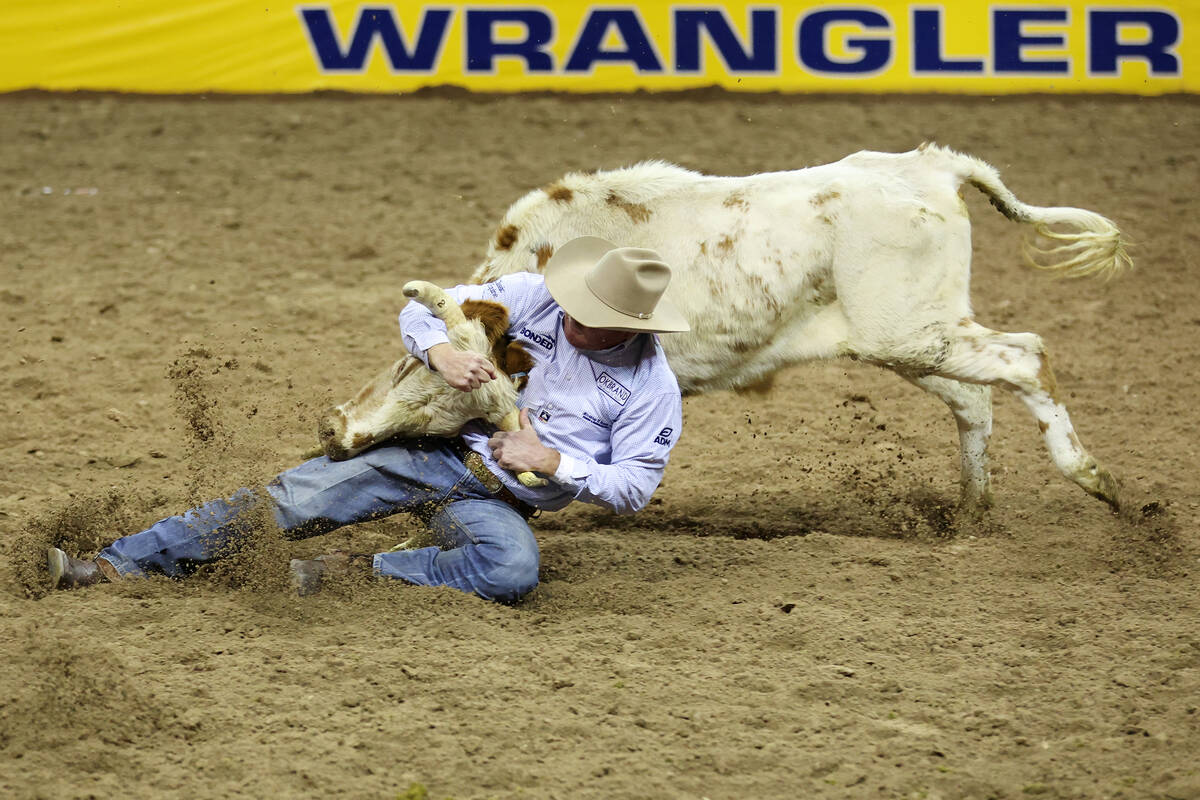 Hunter Cure competes during the steer wrestling event in the 64th Wrangler National Finals Rode ...