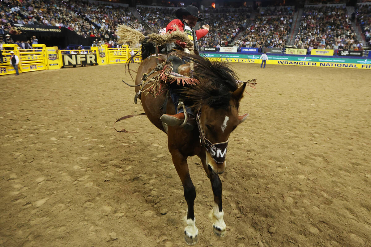 Kolby Wanchuk competes in the saddle event during the 64th Wrangler National Finals Rodeo at th ...