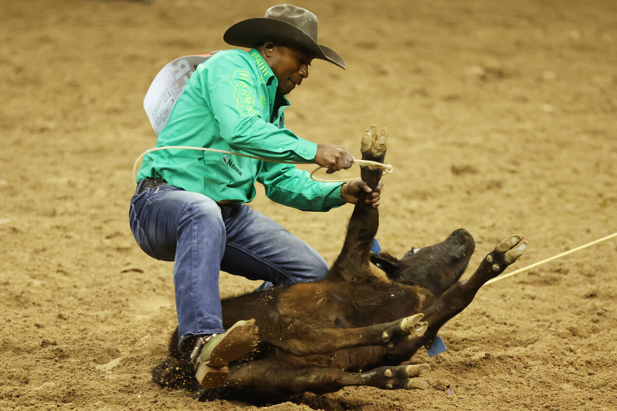 Cory Solomon competes in the tie-down roping event during the 64th Wrangler National Finals Rod ...
