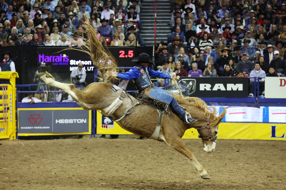 Stetson Wright competes in the saddle bronc riding event during the 64th Wrangler National Fina ...