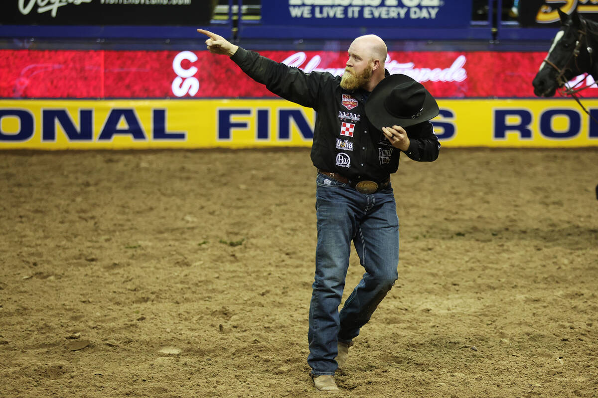 Will Lummus reacts after his run in the steer wrestling competition in the 64th Wrangler Nation ...
