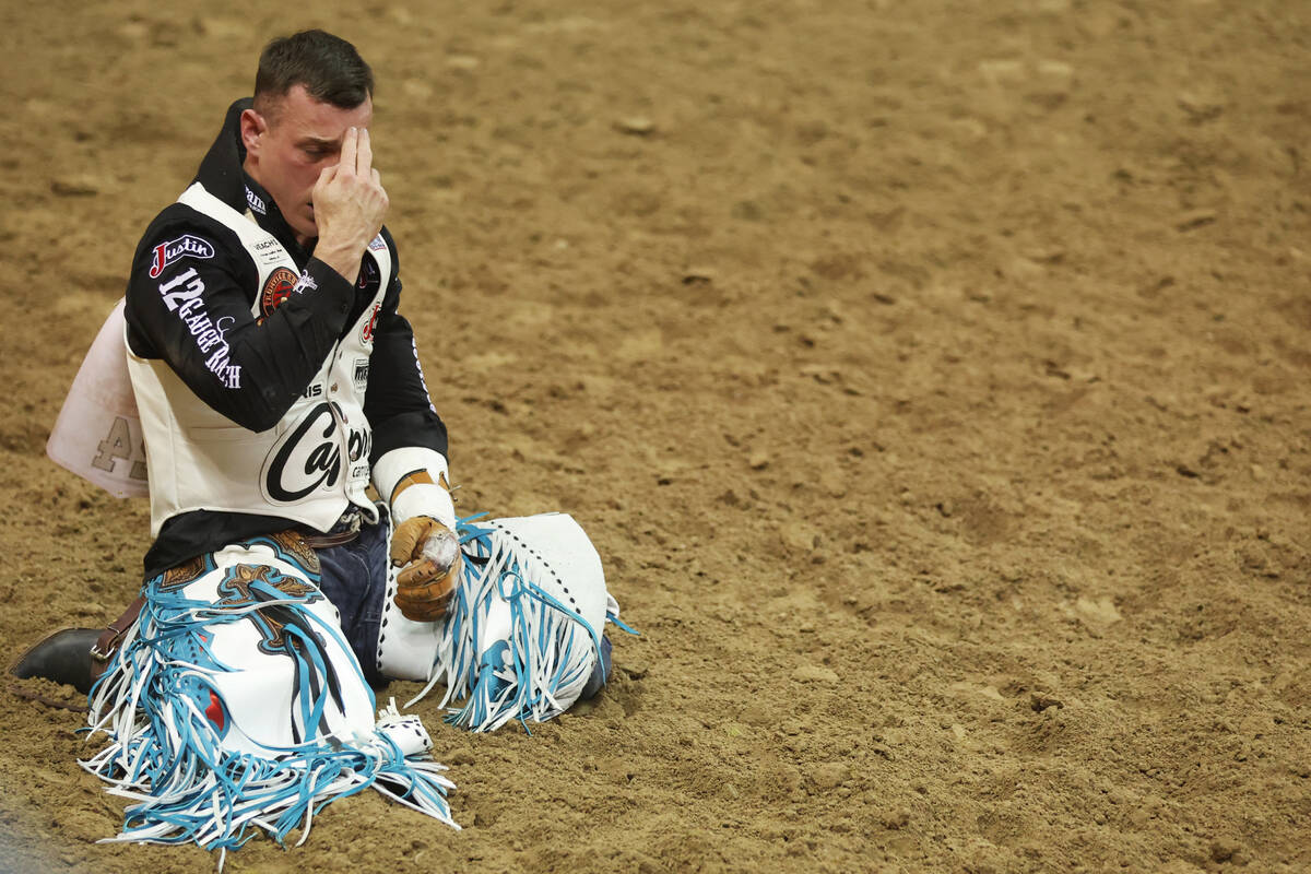 Tim O'Connell reacts after his run in the bareback riding competition in the 64th Wrangler Nati ...