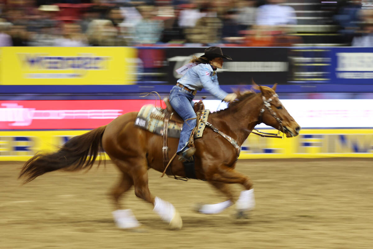 Jordon Briggs competes during the barrel racing event in the 64th Wrangler National Finals Rode ...