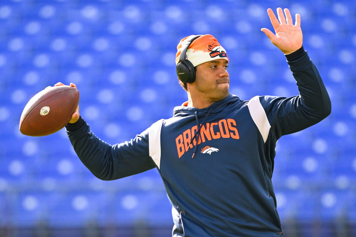 Denver Broncos quarterback Russell Wilson throws the ball during pre-game warm-ups before an NF ...
