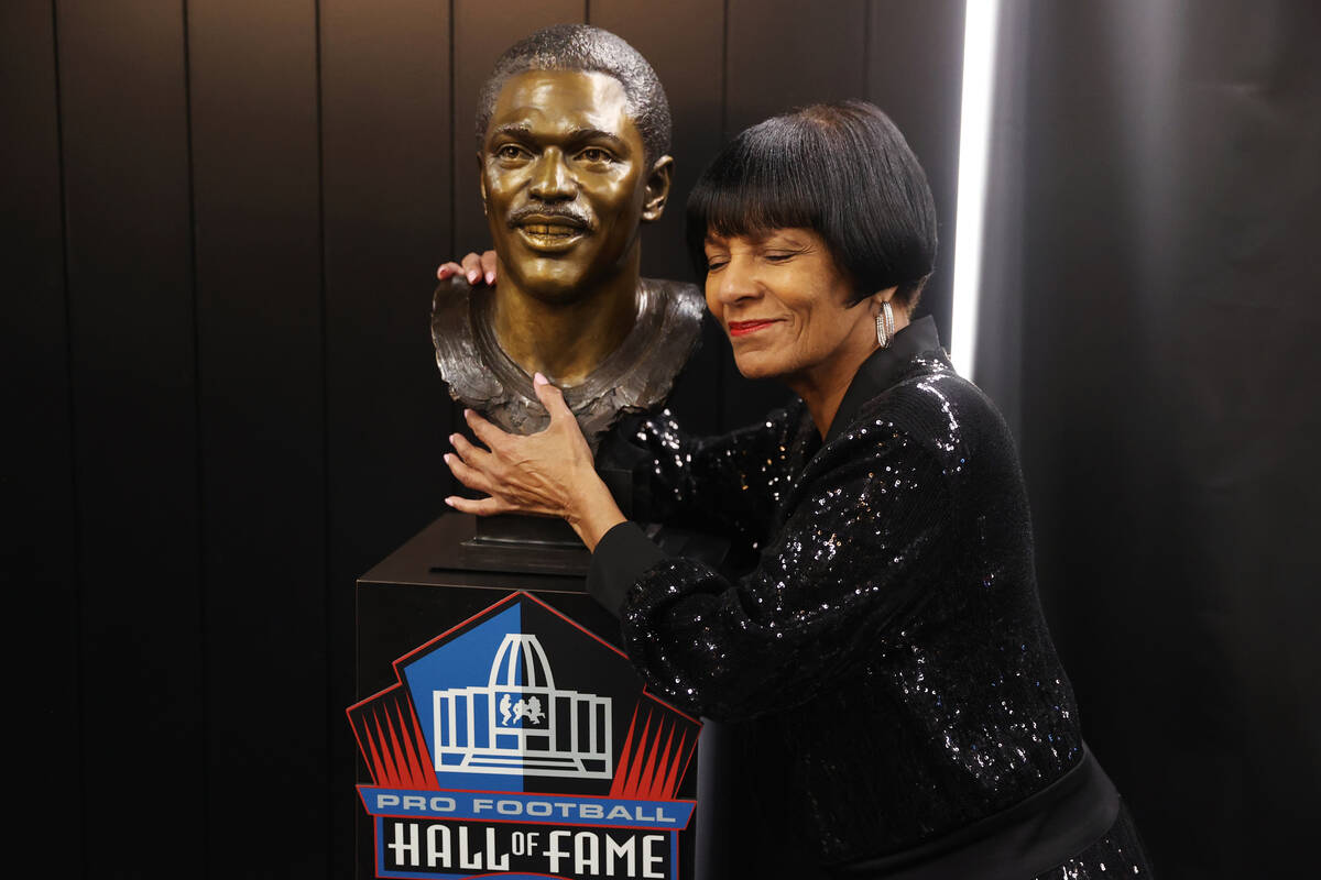 Elaine Anderson, the sister of the late hall of fame football player Cliff Branch, holds the bu ...