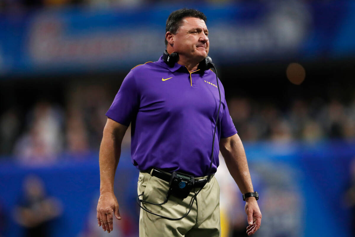 LSU head coach head coach Ed Orgeron waits for players during the first half of the Peach Bowl ...