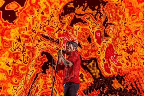 Lead singer Anthony Kiedis sings with The Red Hot Chili Peppers at Allegiant Stadium on Saturda ...