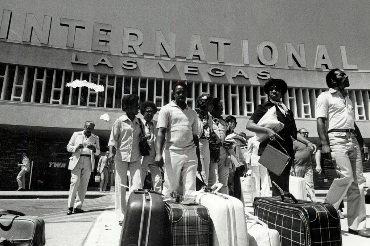 Passengers leave McCarran International Airport on Aug. 5, 1977. (Gary Thompson/Las Vegas Revie ...