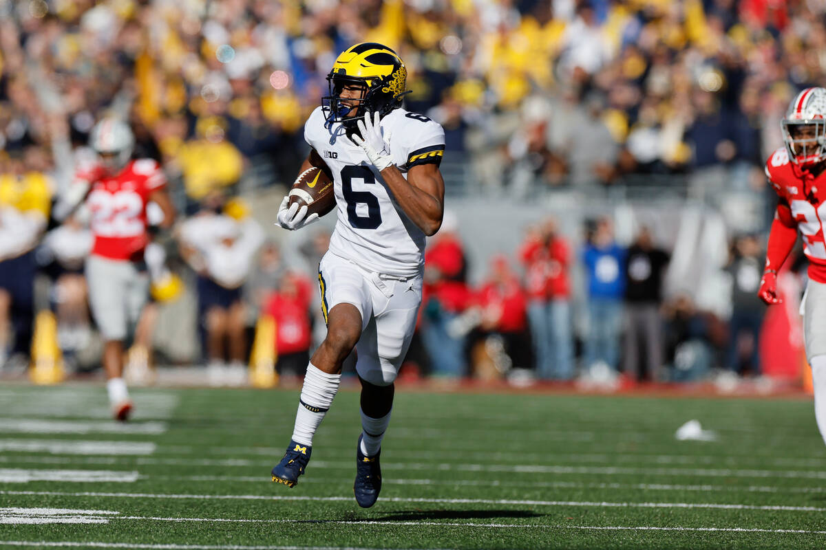 Michigan receiver Cornelius Johnson plays against Ohio State during an NCAA college football ga ...