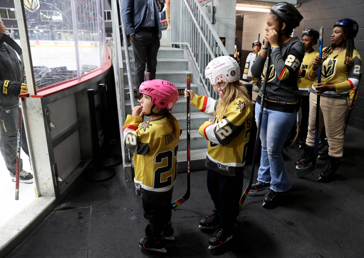 Trinity Jacaruso, 5, left, leads former UMC Children’s Hospital patients onto the ice du ...