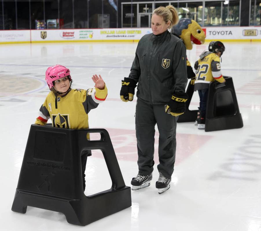 Former UMC Children’s Hospital patient Trinity Jacaruso, 5, waves to the crowd from the ...