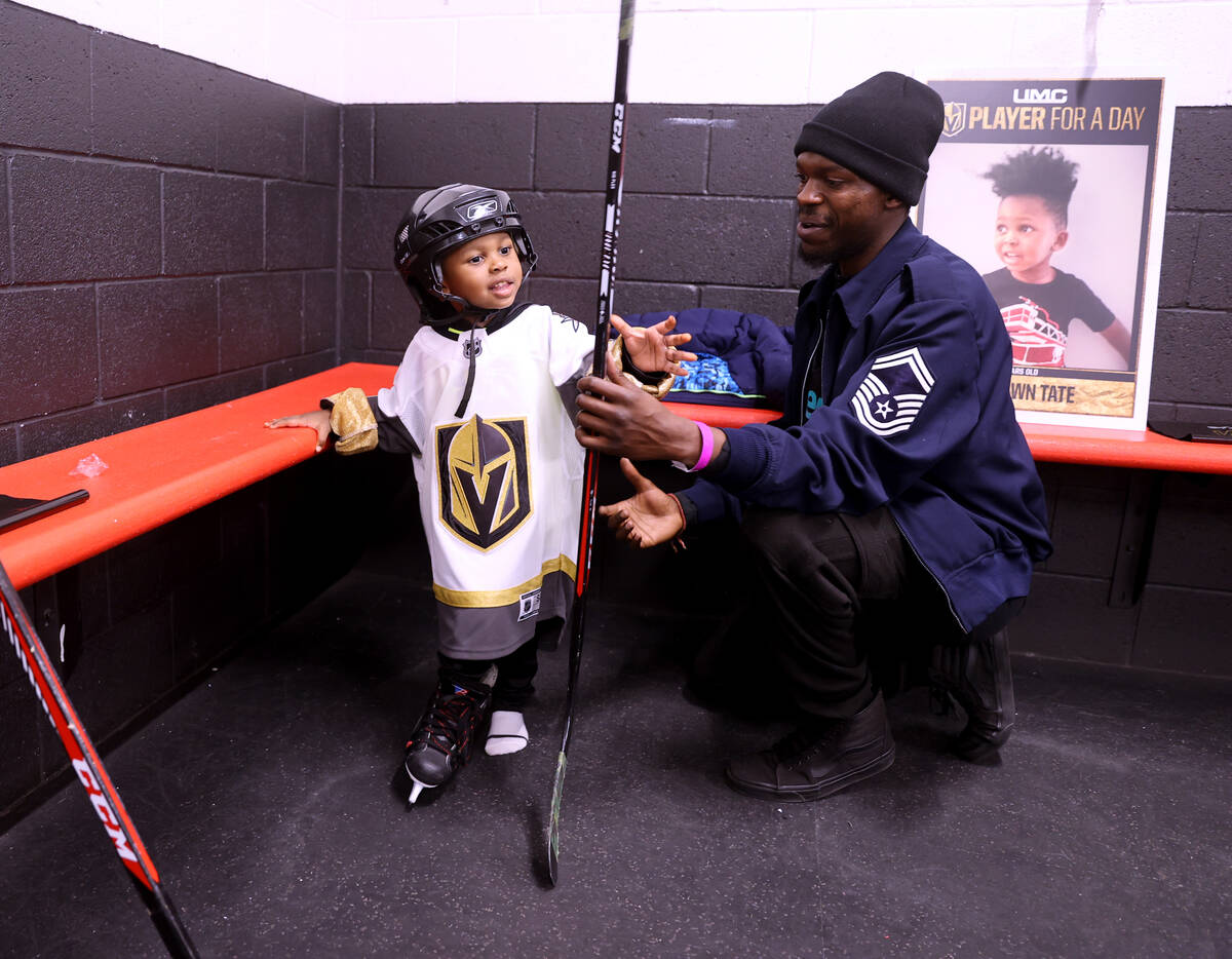 Former UMC Children’s Hospital patient Jahshawn Tate, 2, gets ready to play with the hel ...