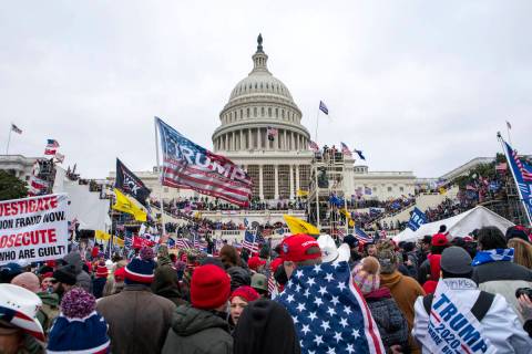 FILE - Rioters loyal to President Donald Trump rally at the U.S. Capitol in Washington on Jan. ...