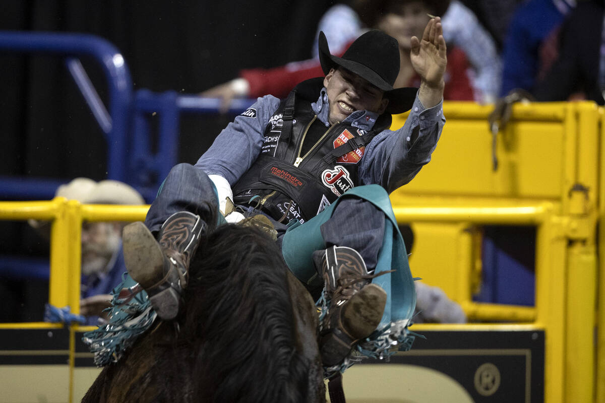 Jess Pope, of Waverly, Kan., competes in bareback riding during the sixth go-round of the Natio ...