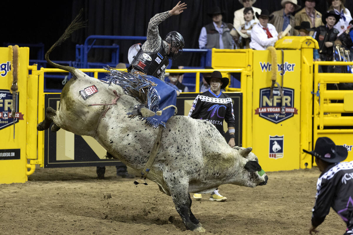Tristen Hutchings, of Monteview, Idaho, competes in bull riding during the sixth go-round of th ...
