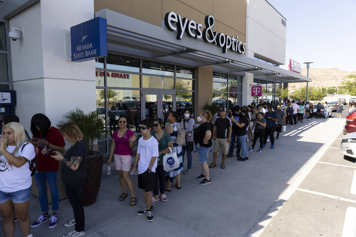 People wait in line during the Daiso store grand opening event in Downtown Summerlin in Las Veg ...