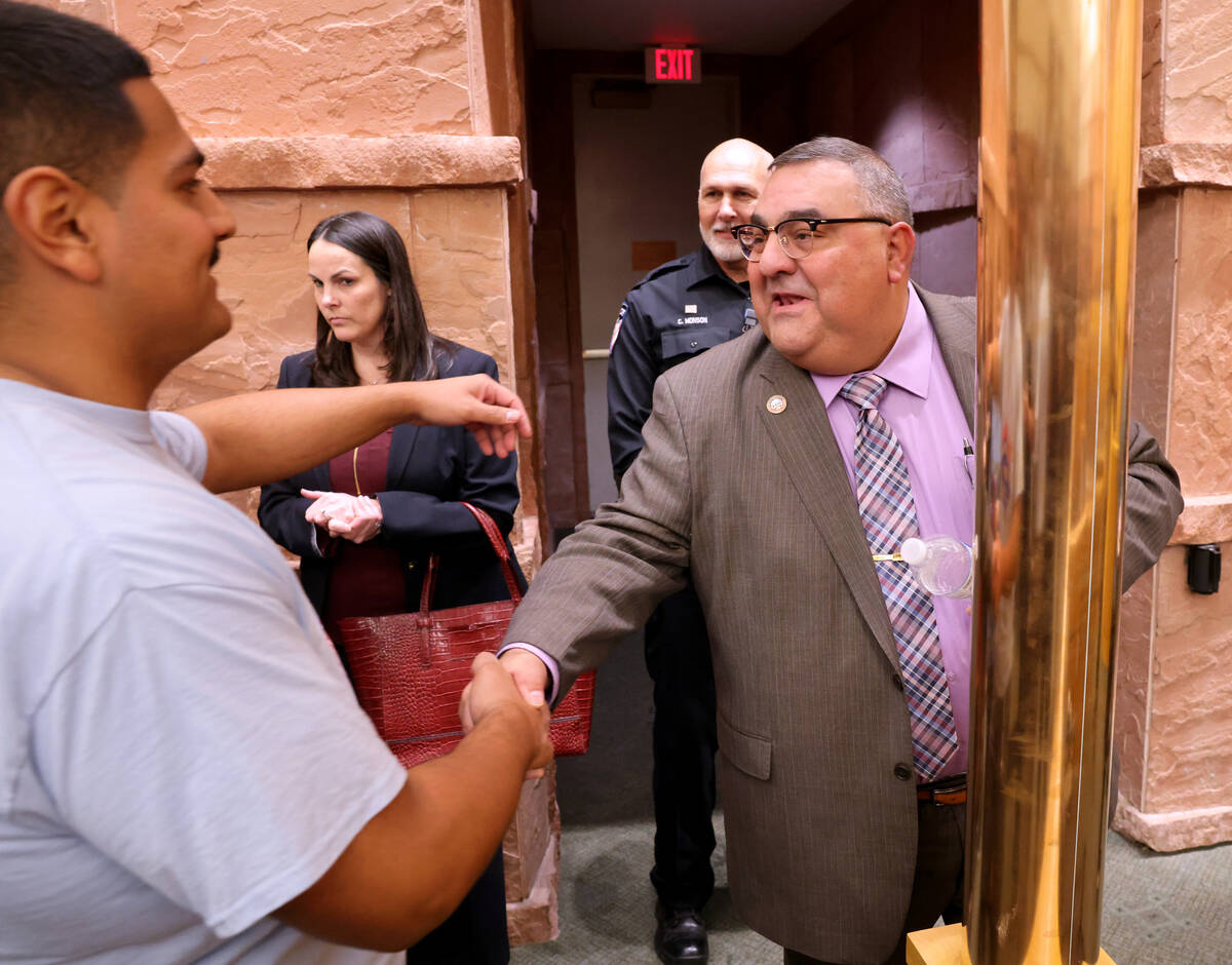 Clark County Registrar of Voters Joe Gloria gets greets a supporter after a Clark County Commis ...
