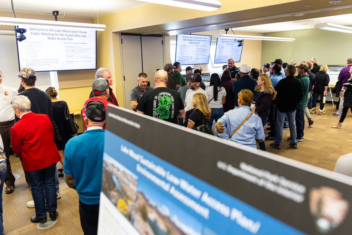 People attend an open house public meeting for the Sustainable Low Water Access Plan of Lake Me ...