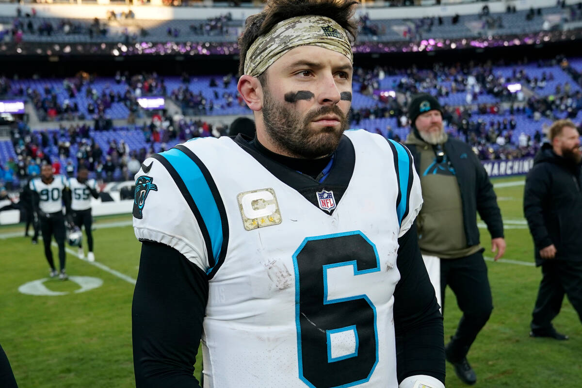 Carolina Panthers quarterback Baker Mayfield (6) walks off the field after his teams loss to th ...