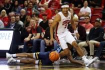 UNLV Rebels guard Justin Webster (2) wins a loose ball against Southern University Jaguars guar ...