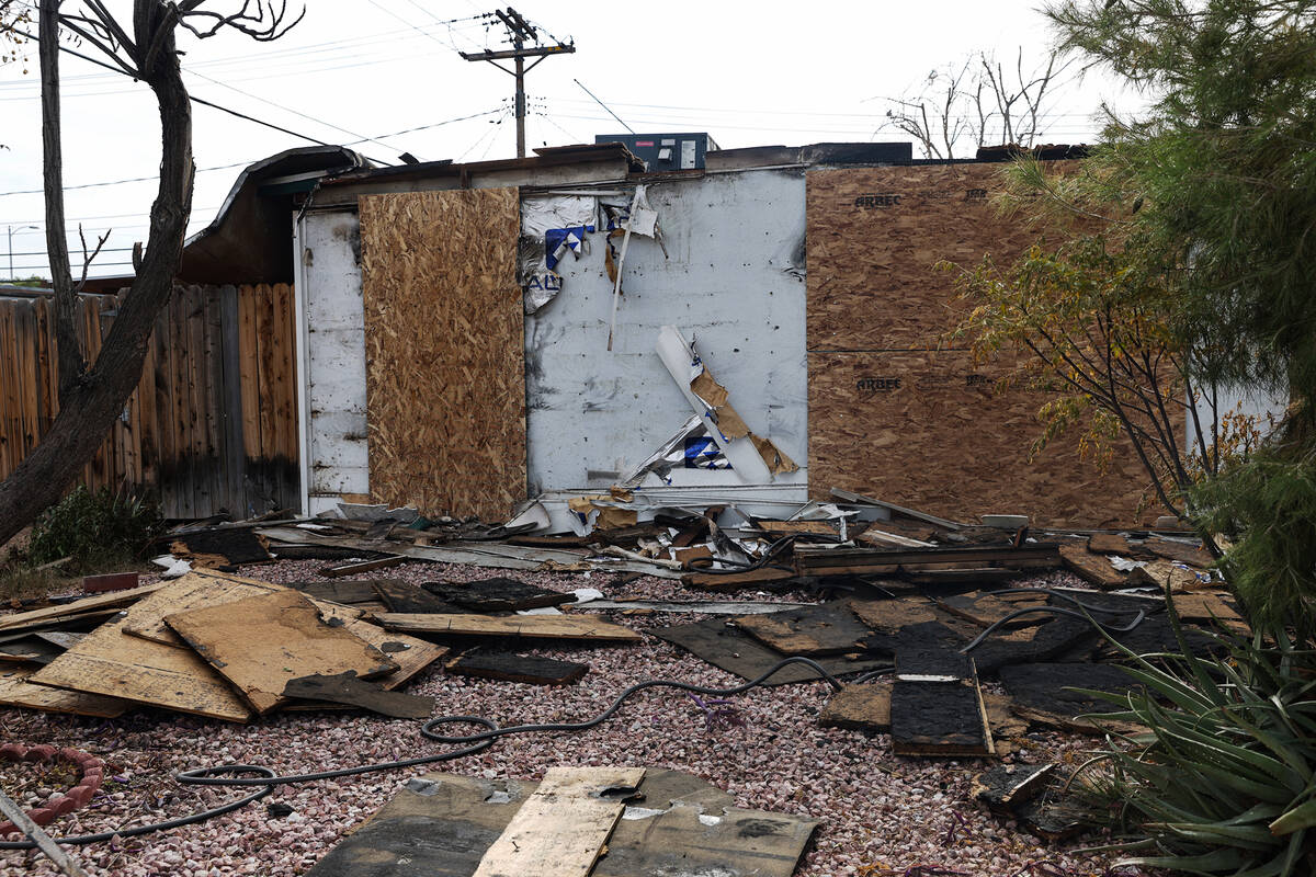 The remains of a house burned by fire at 2116 Hoyt Avenue in Las Vegas on Tuesday, Dec. 6, 2022 ...