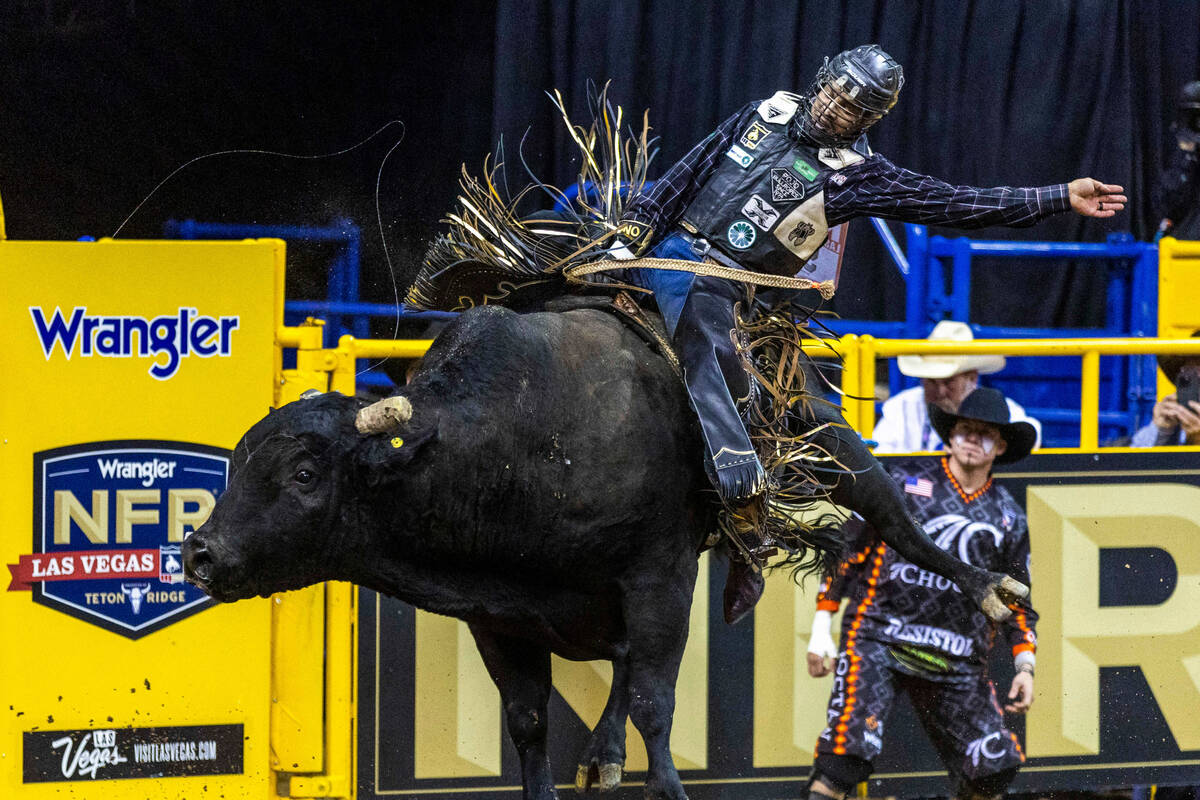 Reid Oftedahl of Raymond, Minn., rides Under The Influence in Bull Riding during the National F ...