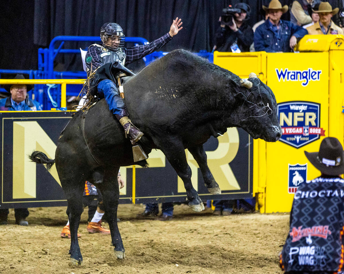 Reid Oftedahl of Raymond, Minn., rides Under The Influence in Bull Riding during the National F ...