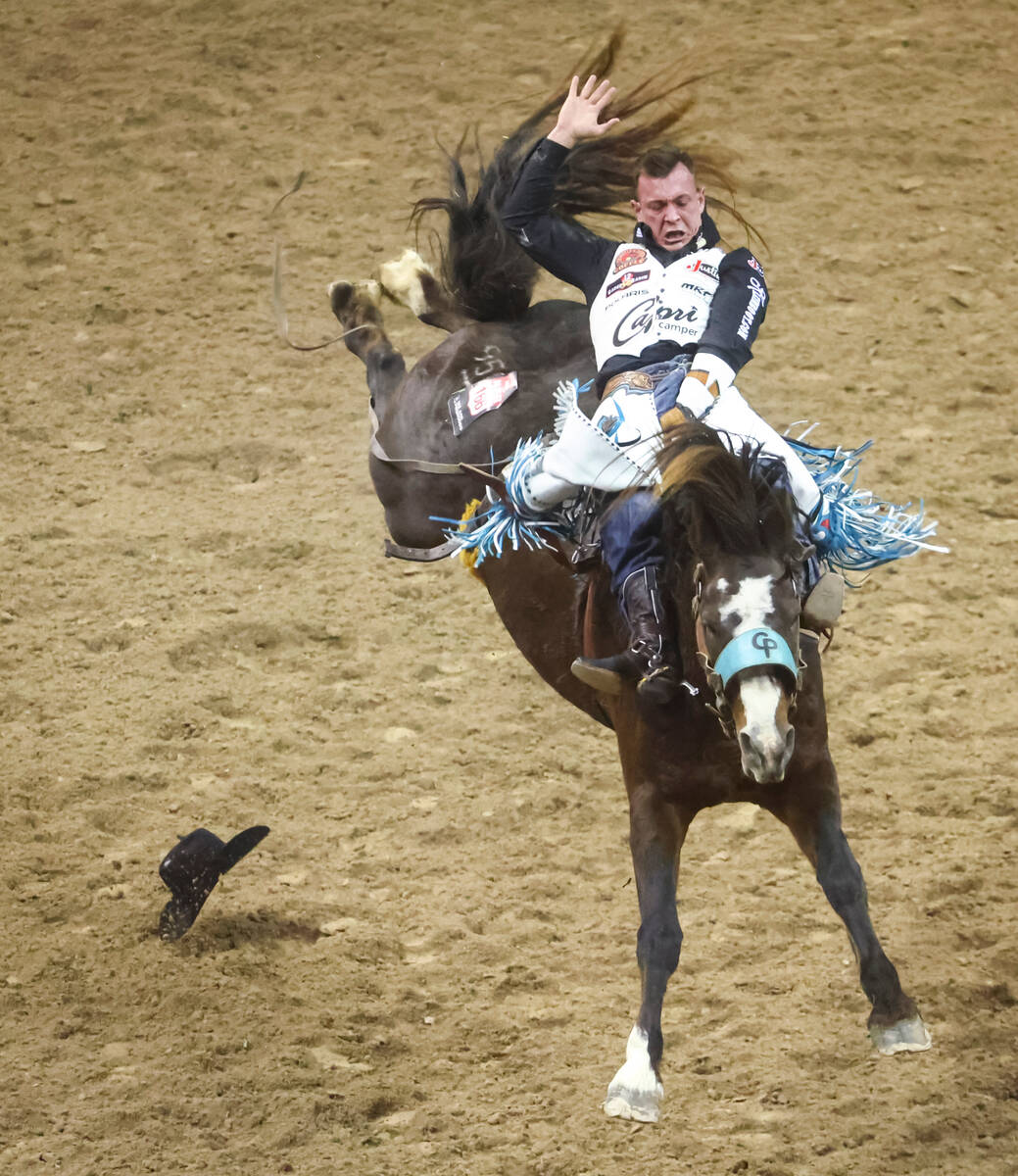 Tim O’Connell, of Zwingle, Iowa, competes in bareback riding during the first night of t ...