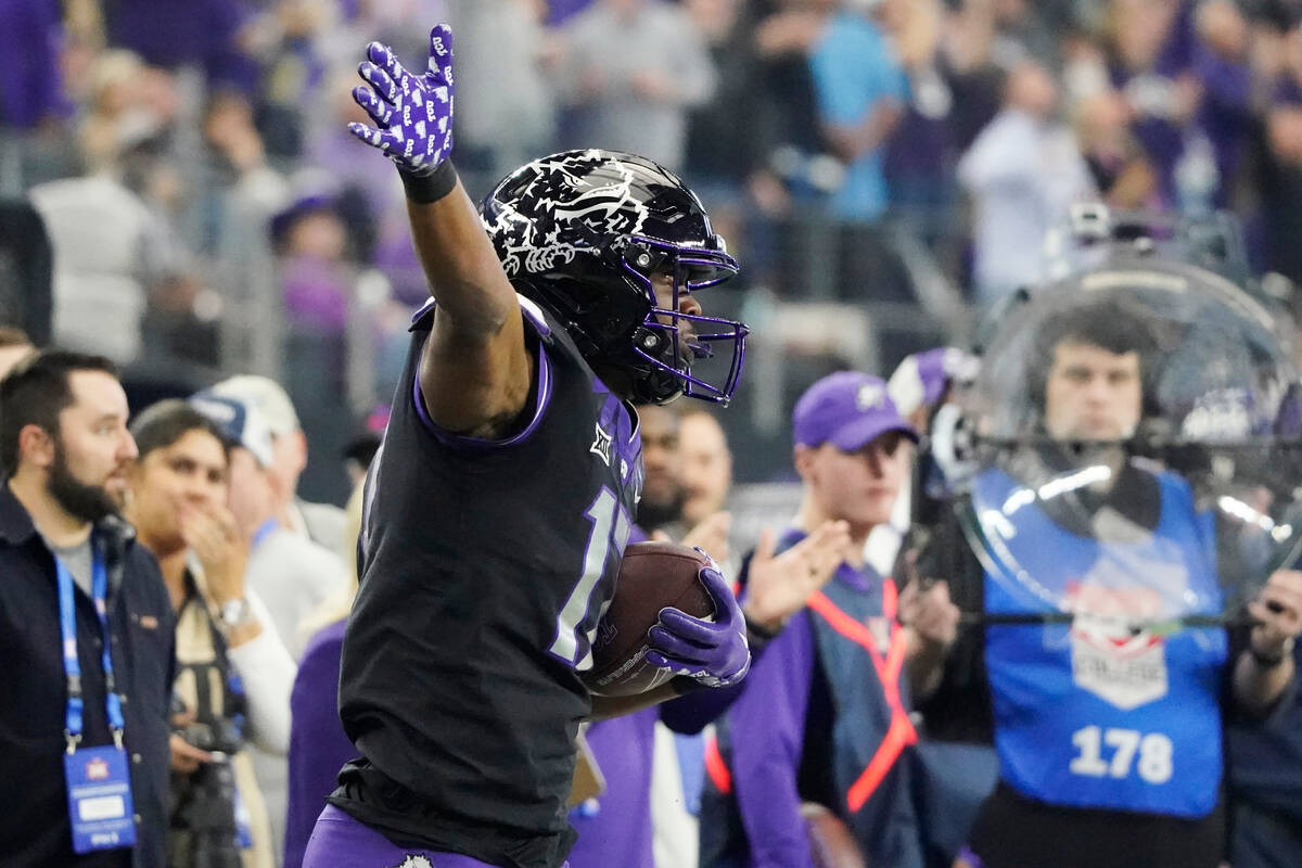 TCU wide receiver Quentin Johnston (1) celebrates a catch for a first down in the second half o ...