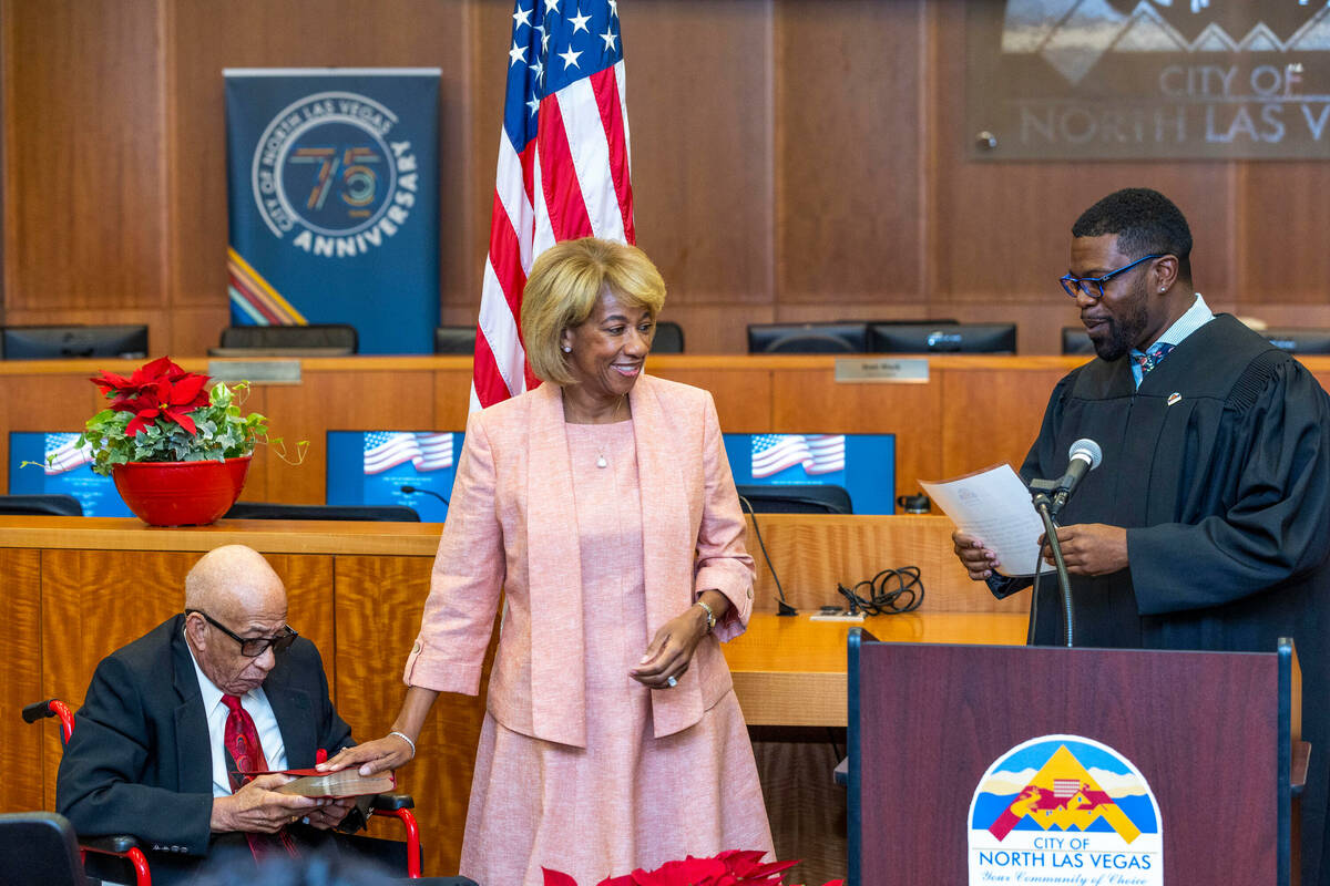 North Las Vegas Mayor Pamela Goynes-Brown, center, is inaugurated by Judge Courtney Ketter beco ...