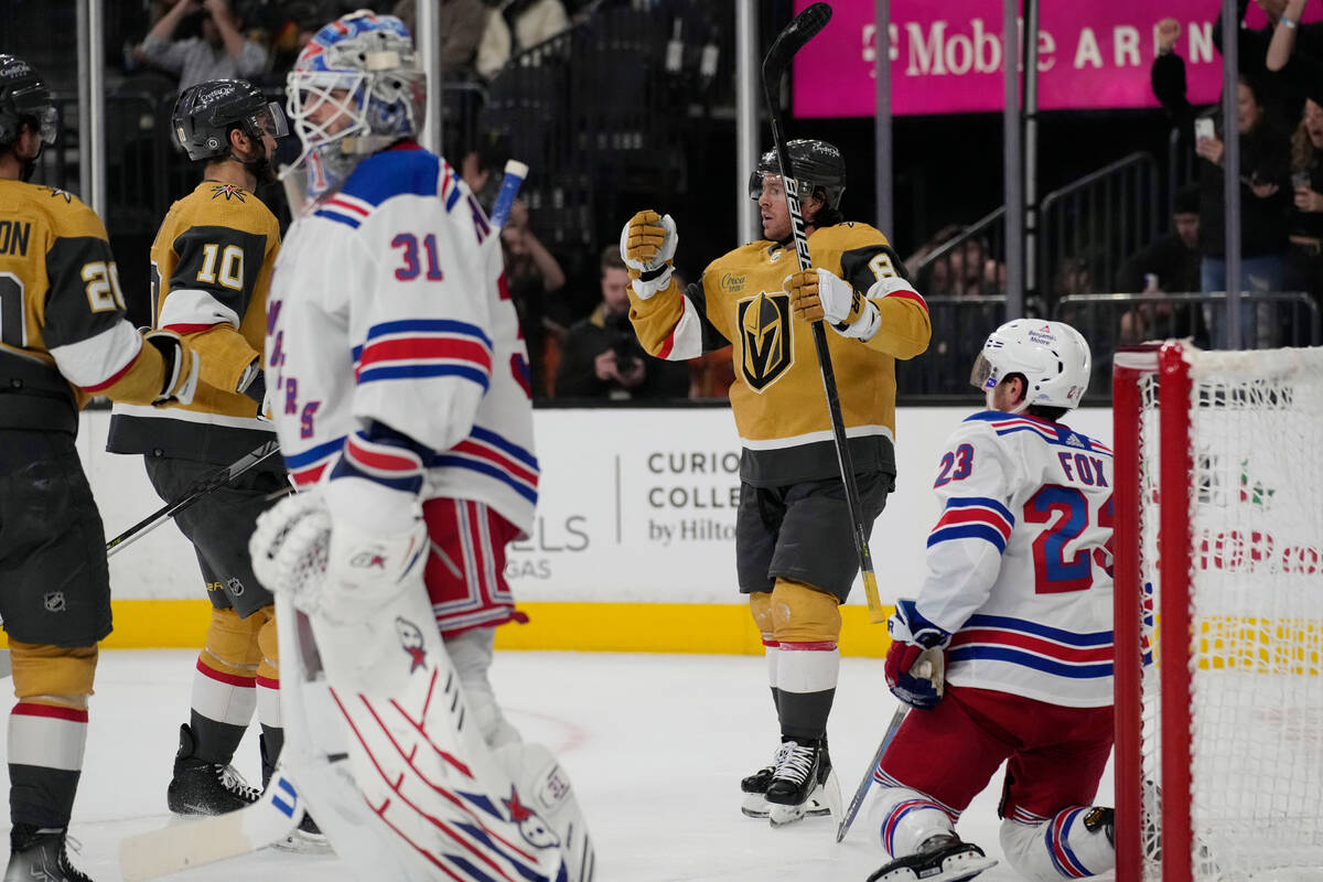 Vegas Golden Knights center Jonathan Marchessault, second from right, celebrates after scoring ...