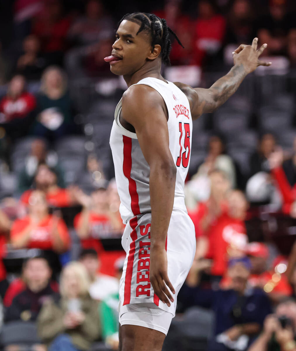 UNLV Rebels guard Luis Rodriguez (15) reacts after a three-point basket during the first half o ...